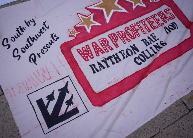 A banner at the Anti-SXSW Fest at City Hall Thursday March 14, 2024. The show featured several bands who boycotted SXSW in opposition to the U.S. Army being a sponsor.